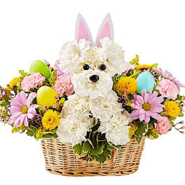 Flower basket with a white dog-shaped arrangement and pastel blooms