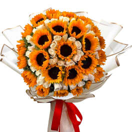 Bouquet of sunflowers and white roses wrapped with a red ribbon