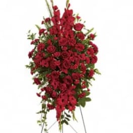 Tall red floral standing spray on an easel