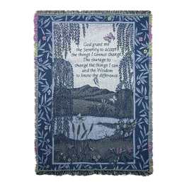 Blue woven blanket with a landscape scene and Serenity Prayer text