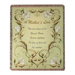 Decorative green throw blanket with 'A Mother’s Love' verse and white lily border