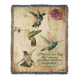 Decorative throw blanket with hummingbirds and a floral quote
