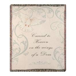 Decorative blanket with a dove and the words "Carried to Heaven"