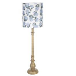 Tall floor lamp with a blue floral shade and gold base