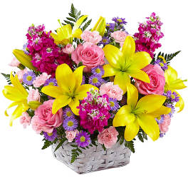 Basket of pink roses, yellow lilies, and purple daisies