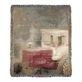Fringed woven blanket with a farmhouse quote and barn scene
