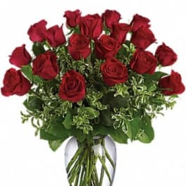 Bouquet of red roses in a clear glass vase