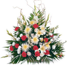 Large floral spray with red, white, and yellow blooms