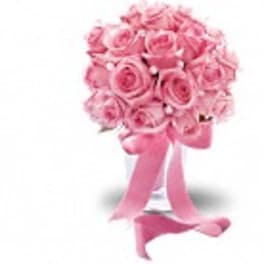 Pink rose bouquet tied with a satin ribbon