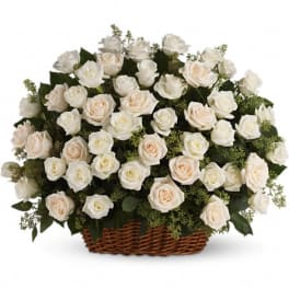 Basket of white and blush roses