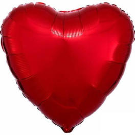 Red heart-shaped foil balloon on a white background