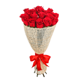 Bouquet of red roses wrapped in burlap with a red ribbon