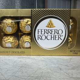 Box of Ferrero Rocher chocolates in gold wrappers
