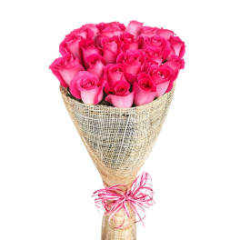 Bouquet of bright pink roses wrapped in burlap with a pink ribbon