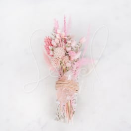 Pink dried flower bouquet wrapped with twine