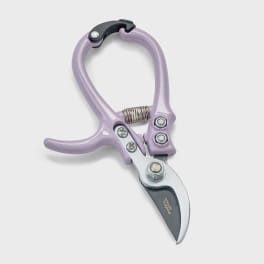 Lavender pruning shears with a curved metal blade on a white background