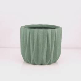 Green textured ceramic planter pot on a white background