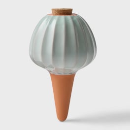 Ceramic bulb-shaped vase with a cork stopper