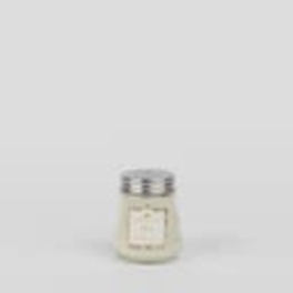 Small white candle in a glass jar with a metal lid