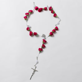 Pink rosebud rosary with a silver crucifix