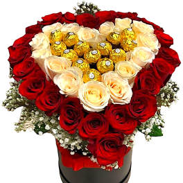 Heart-shaped rose arrangement with chocolates in a black box