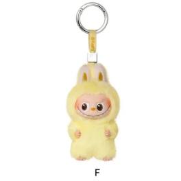 Yellow plush character keychain with a metal ring