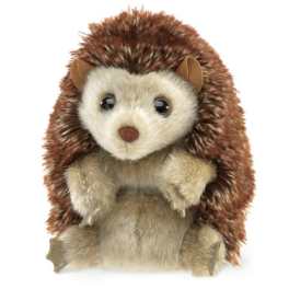 Plush hedgehog toy with brown spiky fur and a cream face