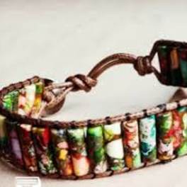 Colorful woven bracelet with a brown cord closure