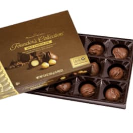 Box of assorted chocolates with the lid partially open