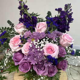 Bouquet of pink and purple roses with lavender chrysanthemums
