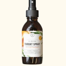 Amber spray bottle labeled throat spray