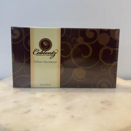 Box of assorted chocolates in brown and cream packaging