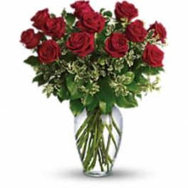 Bouquet of red roses in a clear glass vase