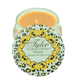 Glass jar candle with a leopard-print label