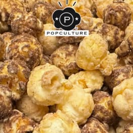 Close-up of caramel and cheese popcorn with a Popculture logo