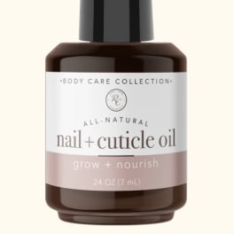 Brown bottle of nail and cuticle oil with a black cap