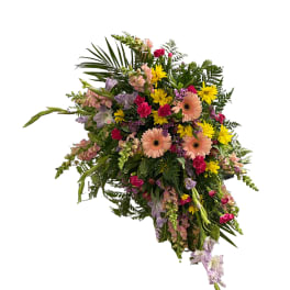 Large mixed floral spray with pink, yellow, and lavender blooms
