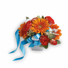 Orange and red floral bouquet with blue ribbon and seashell accents