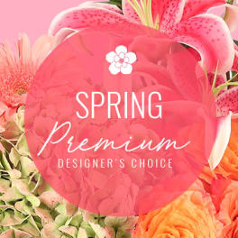 Spring premium designer's choice floral arrangement with pink lilies and orange blooms