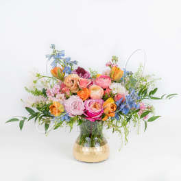 Colorful mixed bouquet in a clear glass vase