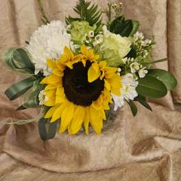 Sunflower bouquet with white blooms and green ribbon