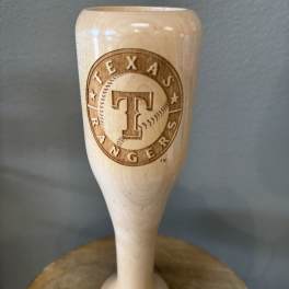 Texas Rangers wooden baseball bat-shaped trophy on a stand