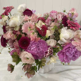 Mixed pink and white bouquet with peonies, ranunculus, and daisies