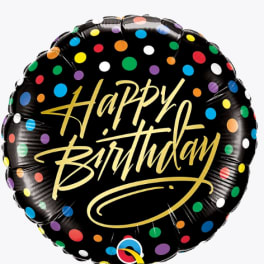 Round birthday balloon with colorful polka dots and gold lettering