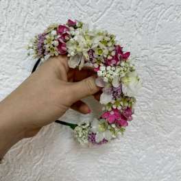 Handheld floral crown with pink and white blossoms