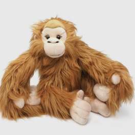 Plush orangutan toy sitting on a white background
