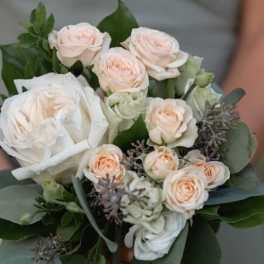 Bouquet of pale pink and white roses with eucalyptus