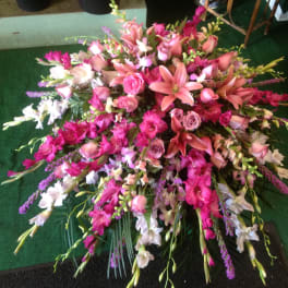 Large pink and white floral spray with lilies and roses