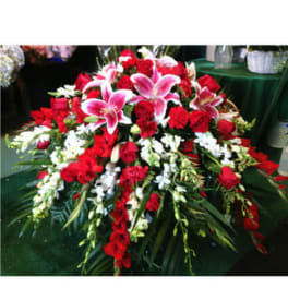Large red and white floral spray with pink lilies