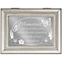 Framed memorial sign with butterflies and floral accents